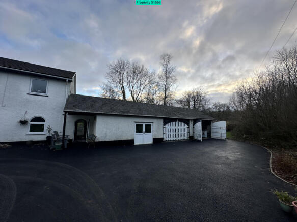 Workshop (4.49m x 5.35m) and Double Garage (8.12m 