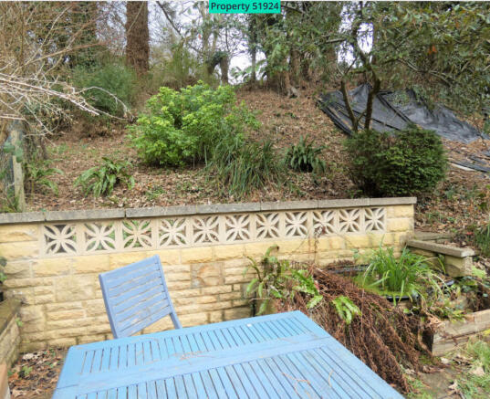 Back garden patio and hillside garden