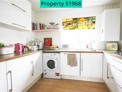 Kitchen with washing machine and dishwasher