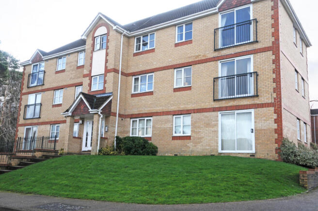A top floor apartment with views across Worth for