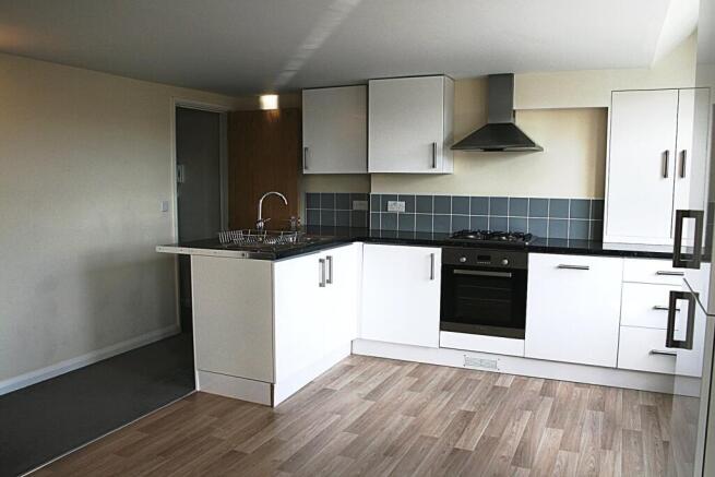 Large modern open plan kitchen with all machines including dishwasher