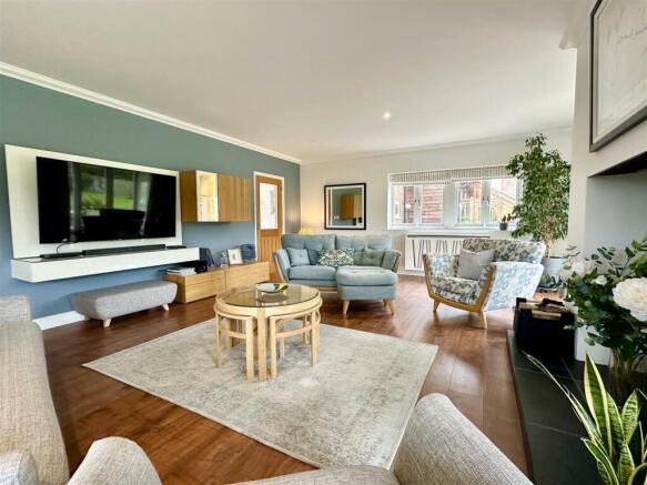 lounge with two sets of doors from living area.JPE
