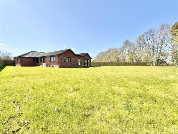 rear aspect and garden