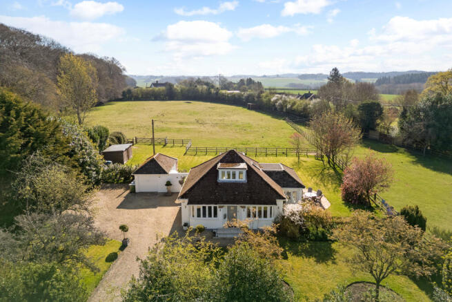 Front Elevation with Paddocks behind
