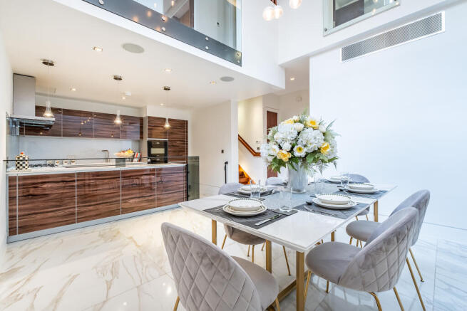 Open Plan Kitchen / Dining Room with double height ceiling