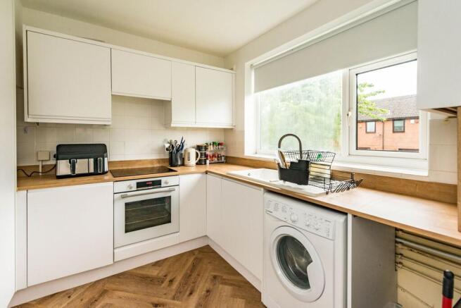 SITTING ROOM/DINING ROOM AND NEWLY FITTED KITCHEN