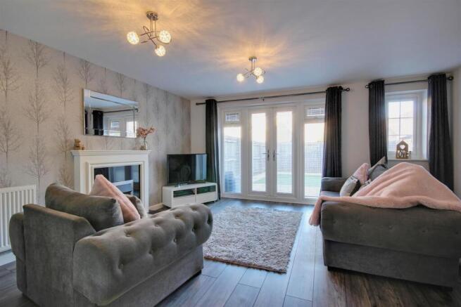 Sitting area with french doors to garden