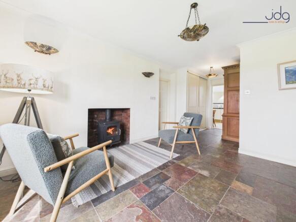 The snug with wood burning stove