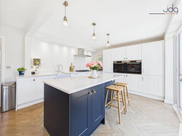 Shaker-style kitchen with integrated appliances
