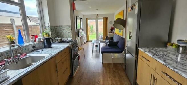 Marble effect worktops in eat in kitchen