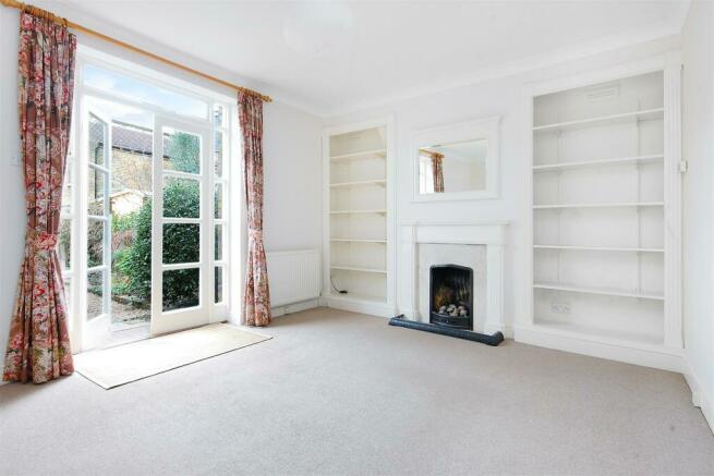 French doors leading out to garden from loungeRece