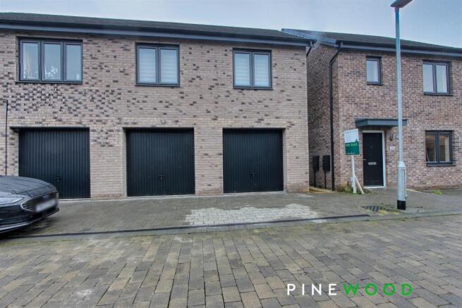 TWO SINGLE GARAGES