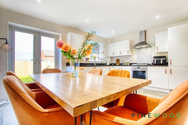DINING AREA AND KITCHEN