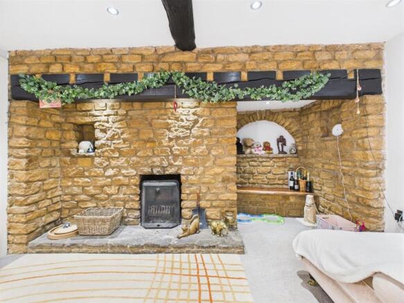 Stone Inglenook with an open fire