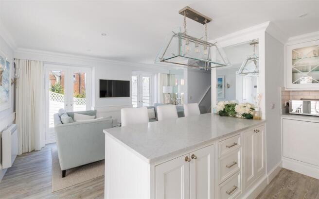 Kitchen opening to Sitting Room