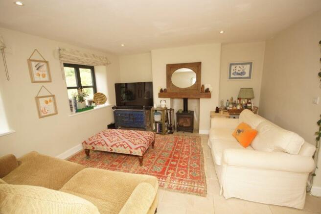 2 Hinton Farm Cottages Sitting Room 2.jpg