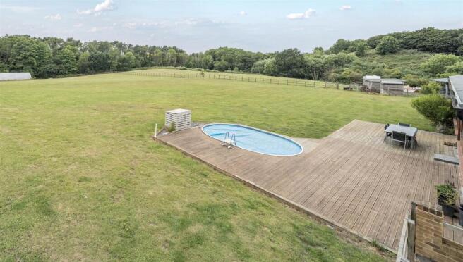 Swimming pool & decking to rear