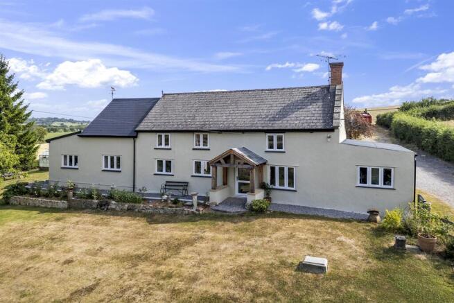 Front drone shot of property