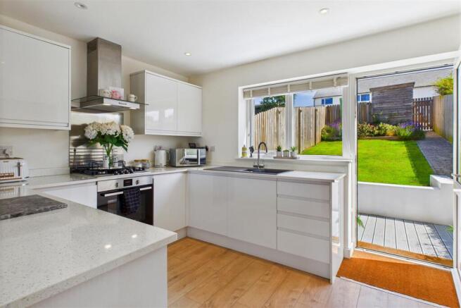 Kitchen and rear garden.