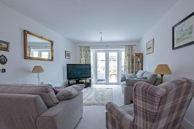 Sitting room with door to conservatory