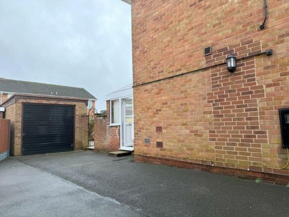 Driveway + Garage