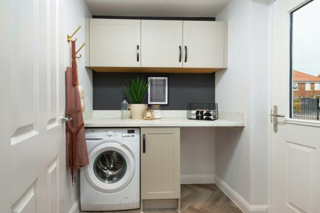 Hertford neutrally decorated utility room with external door