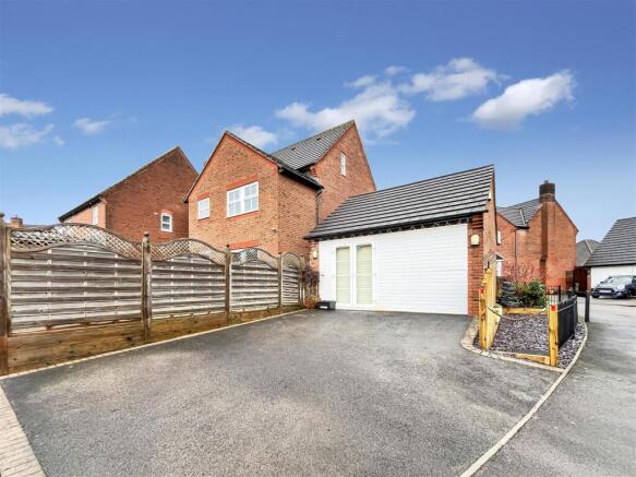 Double Garage And Driveway Parking