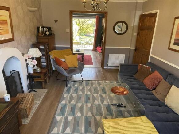 Sitting Room through to Garden room.JPG