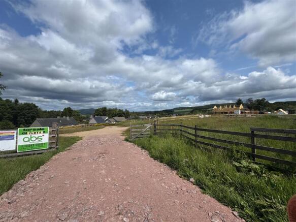 photo with for sale sign 2.jpg