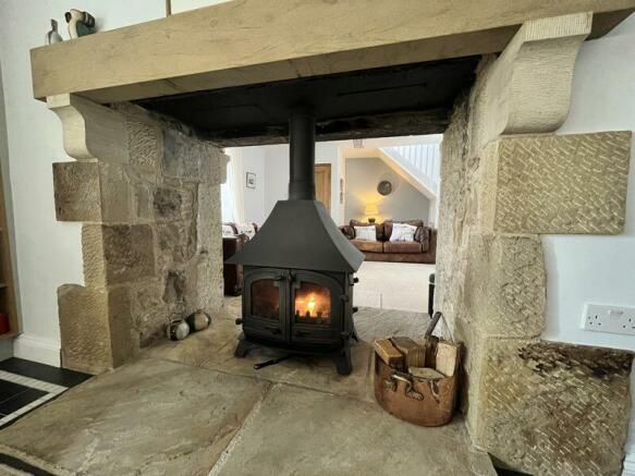Inglenook with double sided stove