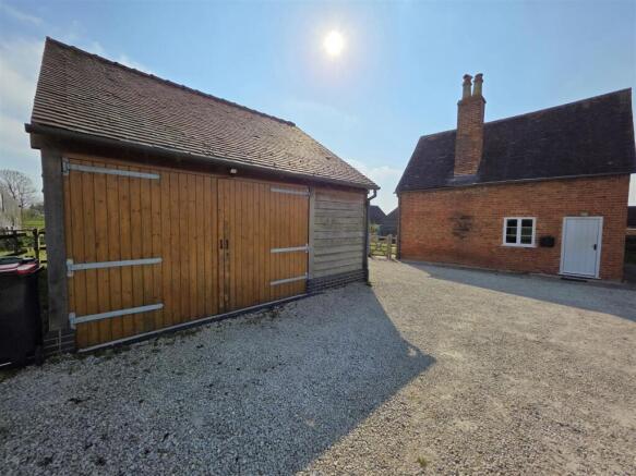 DOUBLE GARAGE AND DRIVE