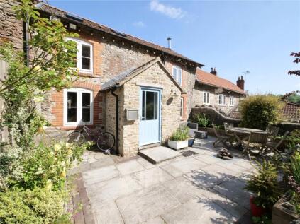Charming Three-Bedroom Cottage in a Prime Village Location