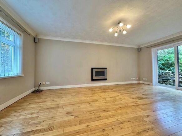 Large living room with doors to garden