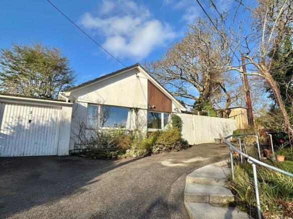 Front with driveway parking