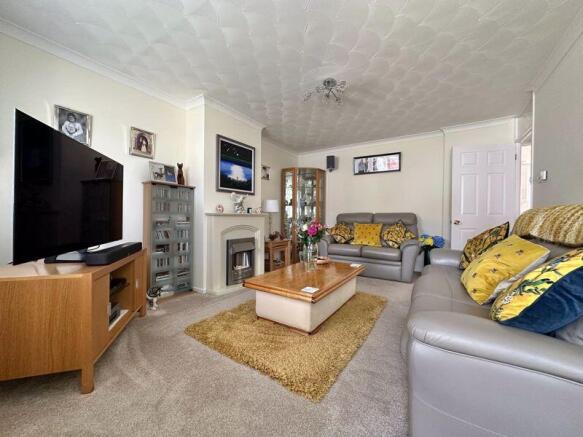 Living room with feature fire