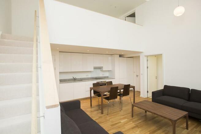 Duplex apartment with open plan living area.