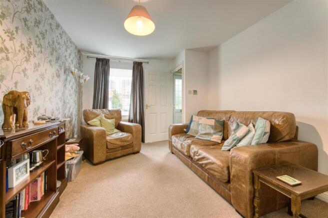 Sitting Room towards front door.jpg