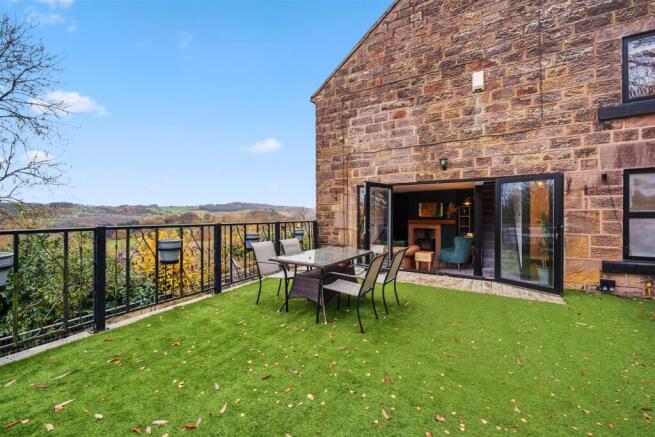 Garden Terrace to view and Sitting Room.jpg