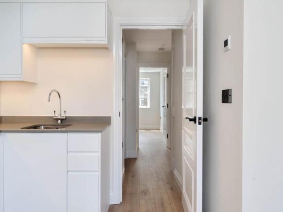 kitchen through bedr
