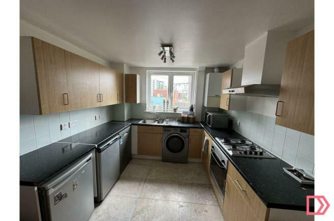 Fully equipped kitchen with marble flooring