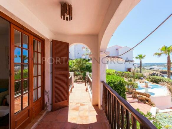 Terrace of a beautiful flat with sea views in Playas de Fornells.