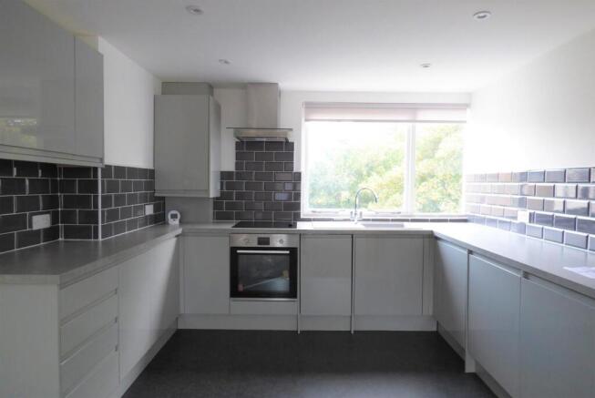 Lounge incorporating open-plan kitchen