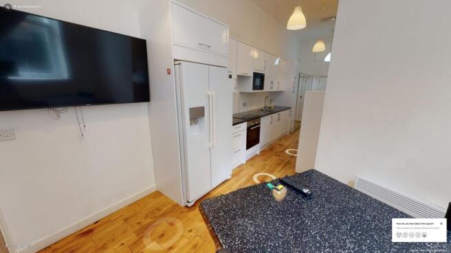 Bar Table TV and Kitchen