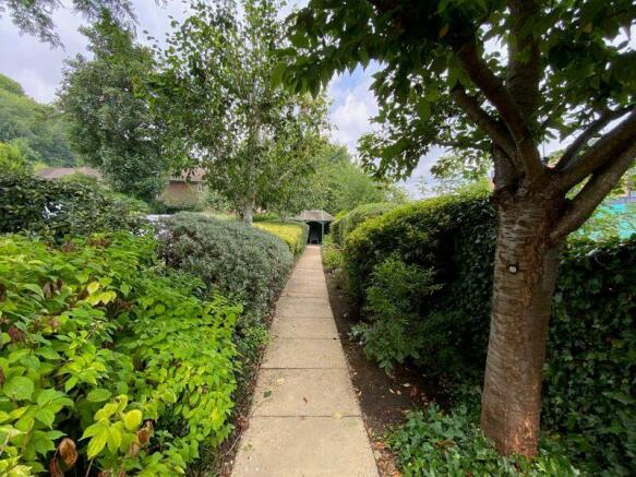 PATH TO PERGOLA FROM THE PROPERTY