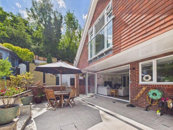 REAR PATIO WITH ALL YEAR ROUND COVERE...