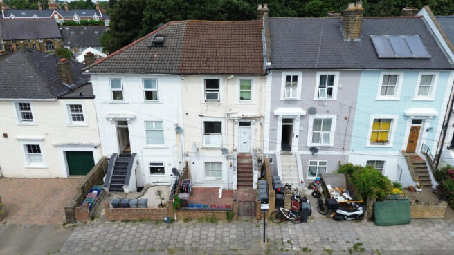 A charming three-bedroom first floor period conve