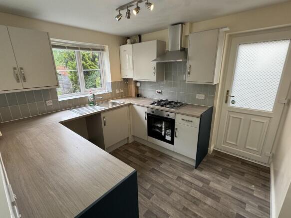 Kitchen from dine...