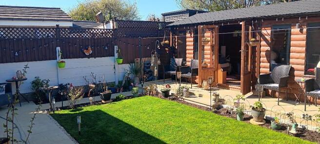 Rear Garden and Log Cabin