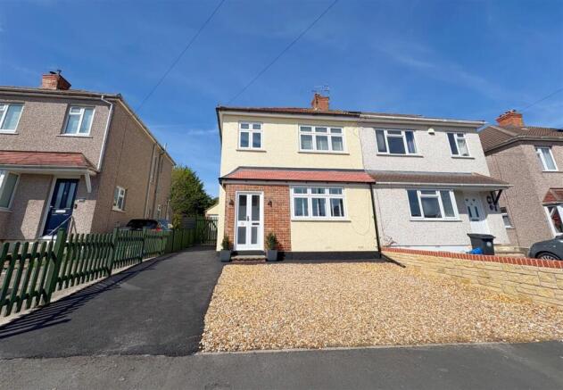 Front shot of property and driveway.jpg