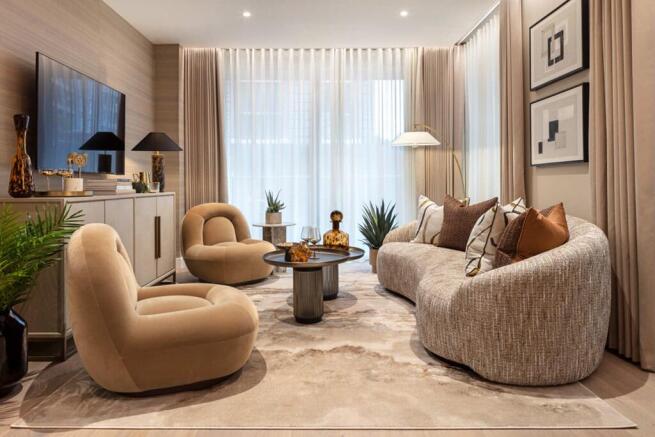 Floor to ceiling windows flood the room with light